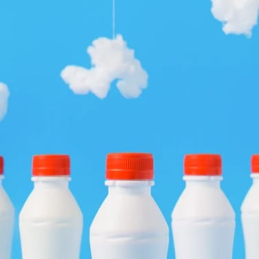 Milkbottles in a blue sky